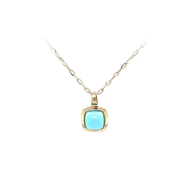 镶蓝色宝石的黄金吊坠