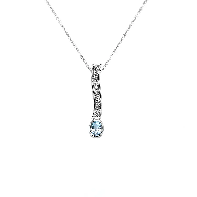 镶蓝色托帕石和钻石的黄金吊坠